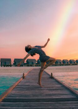Woman dancing on a beach