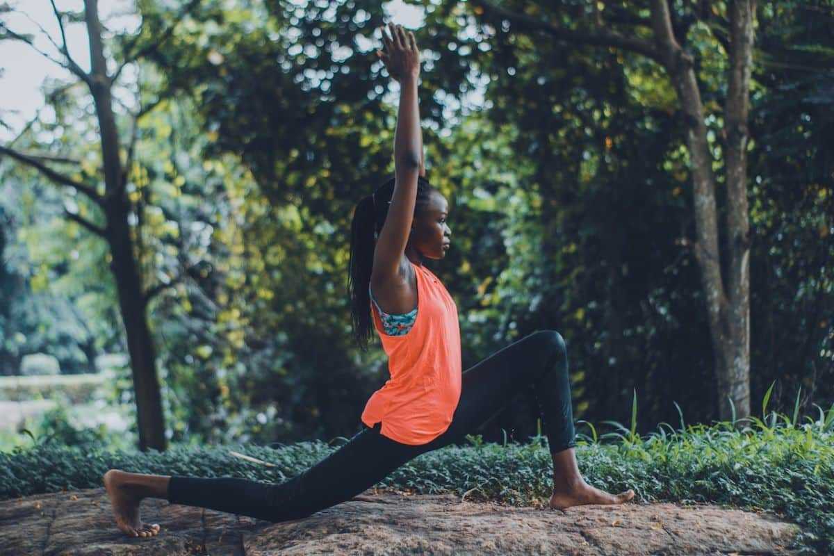 Woman doing yoga outdoors