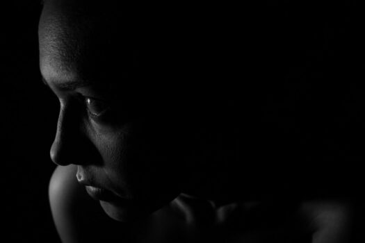 Sad woman domestic violence survivor.