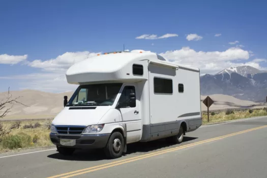 Motorhome on a desert road.