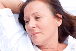 Woman looking sad and thoughtful.