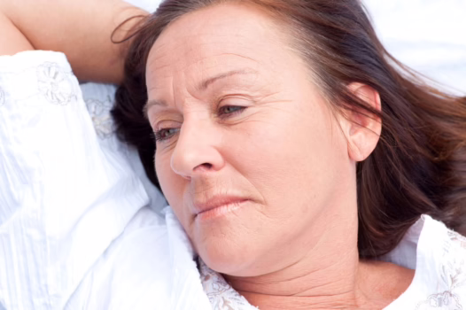 Woman looking sad and thoughtful.