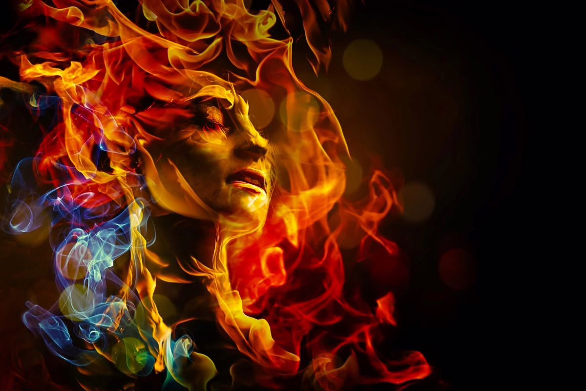 Coping with disability burnout. Woman with fire radiating from her hair.