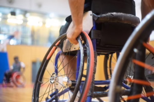 Person using a sports wheelchair