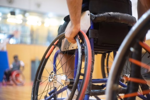 Person using a sports wheelchair