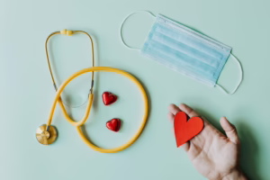 Nurse equipment including stethoscope and mask.