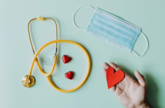 Nurse equipment including stethoscope and mask.