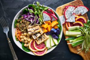 Healthy vegetables and fruit on a plate.