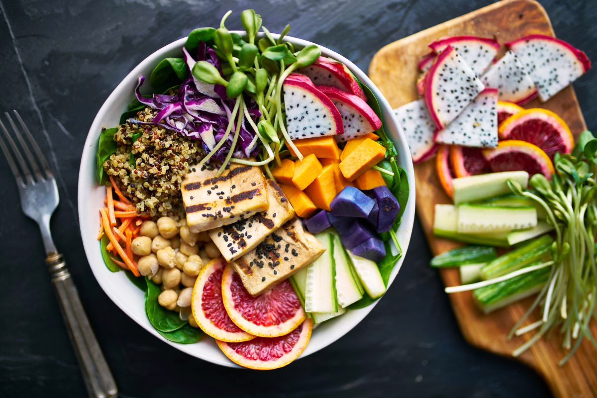 Healthy vegetables and fruit on a plate.