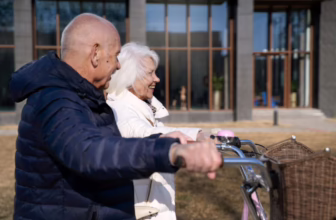 Senior couple walking outdoors.