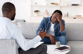 Therapist talking to client.