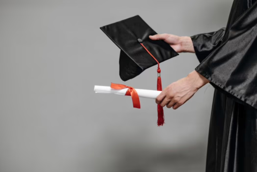 Graduation cap and gown.