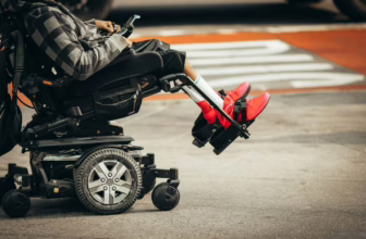 Man using power wheelchair.