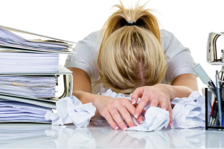 Woman with a disability who is stressed at work.