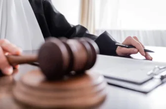 Judge holding gavel.