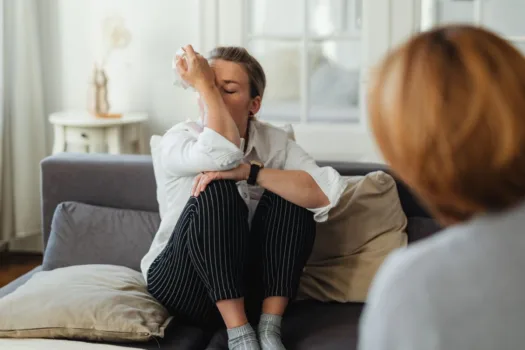 Woman in substance abuse treatment therapy.