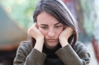 Sad and stressed woman struggling with addiction.