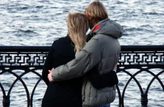 Couple looking out at the ocean.