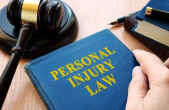 Personal injury law book and judge's gavel.