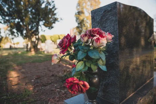 Tombstone with flowers.