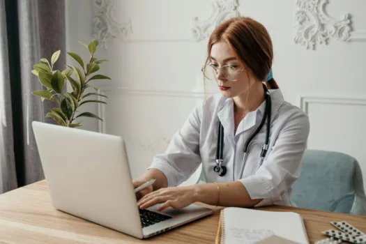Nurse using computer.