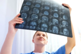 Show Me, Don’t Just Tell Me: How Caregivers Can Ask for Visual Explanations of a Diagnosis